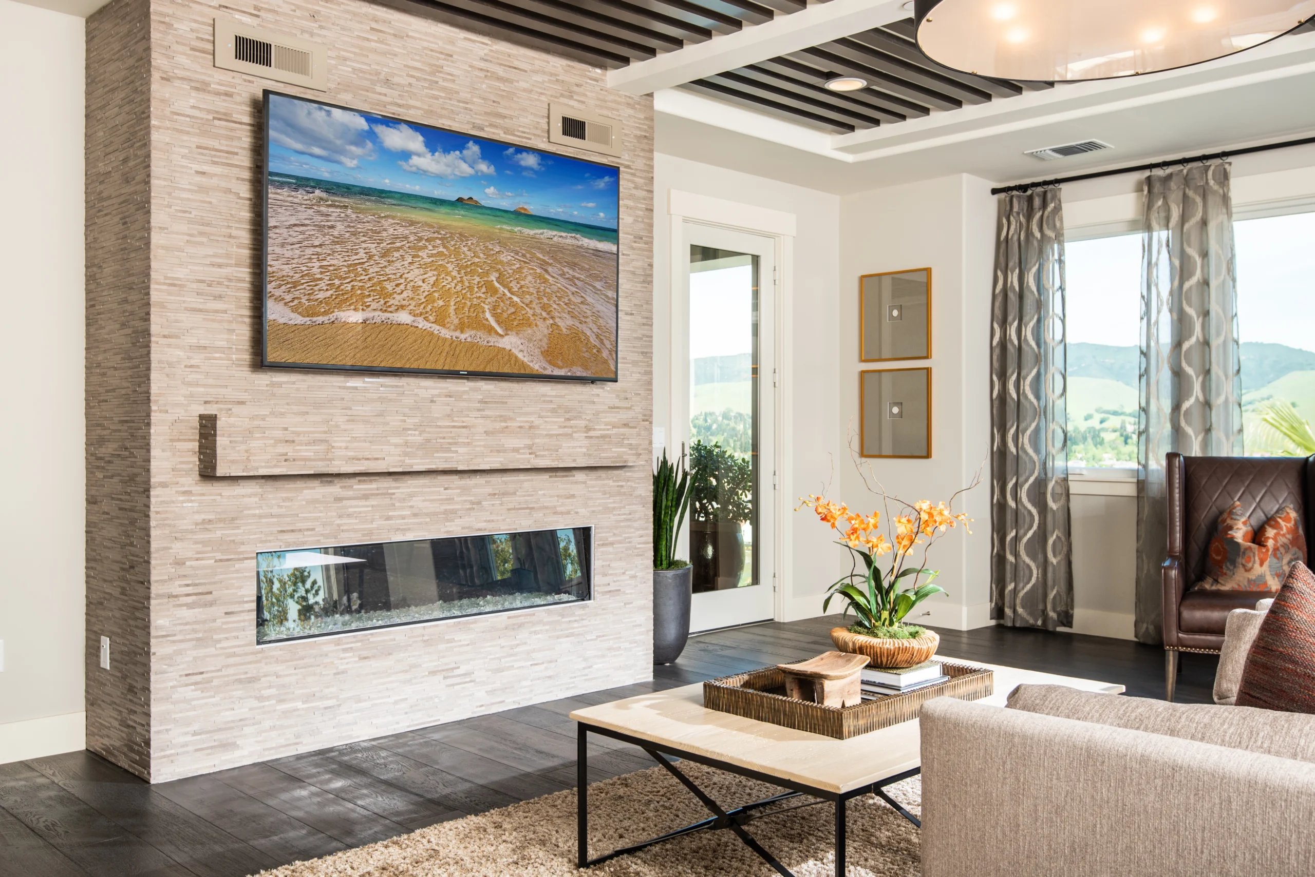 Stacked stone fireplace wall with custom hearth